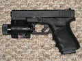 Glock Model 23 with tactical light and laser sight..jpg